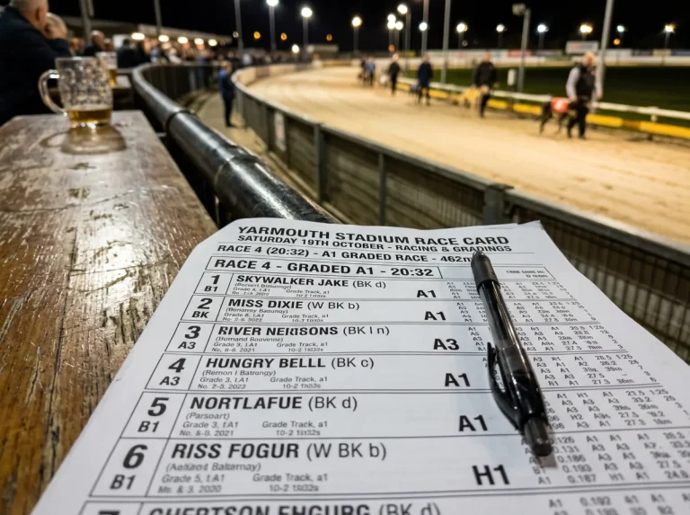 Grading board displaying race grades from A1 to A10 at a greyhound stadium