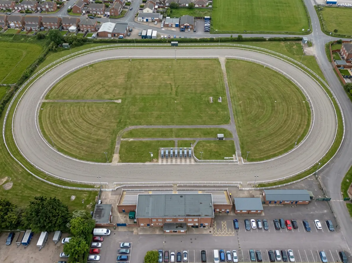 Aerial view of Yarmouth greyhound track showing the 382-metre oval circuit and starting traps